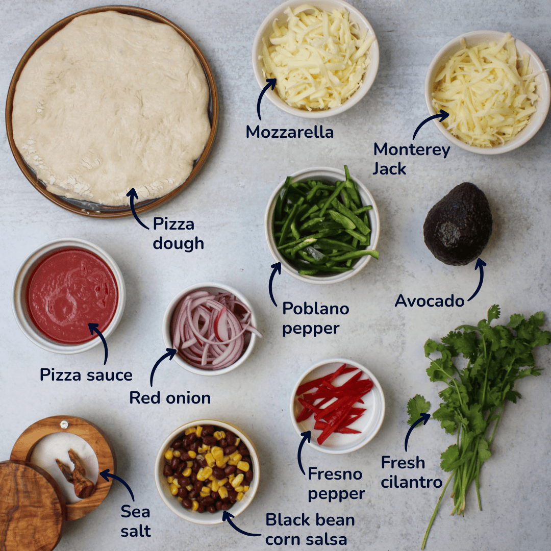 Ingredients for making southwest veggie pizza: pizza dough, mozzarella, monterey jack, poblano pepper, fresno pepper, red onion, pizza sauce, black bean corn salsa, sea salt, avocado, and fresh cilantro.