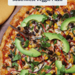 A colorful southwest veggie pizza topped with avocado slices with a title overlaid.